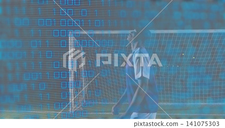 Standing player in blue bib looking up on pitch near goal with binary overlay, copy space Standing player in blue bib looking up on pitch near goal with binary overlay, copy space 141075303
