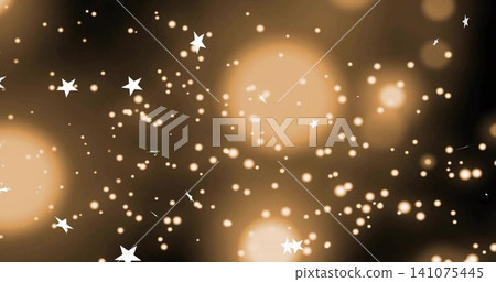 Glowing golden bokeh orbs and white stars floating in dark abstract backdrop with small light dots 141075445