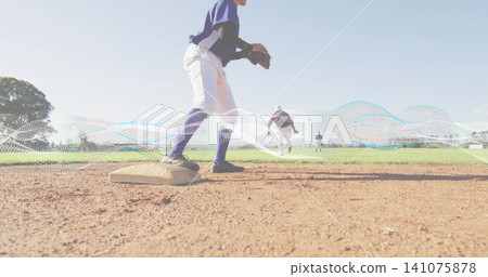 Standing fielder wearing blue jersey and white pants holding glove on first base, waveform overlay Standing fielder wearing blue jersey and white pants holding glove on first base, waveform overlay 141075878