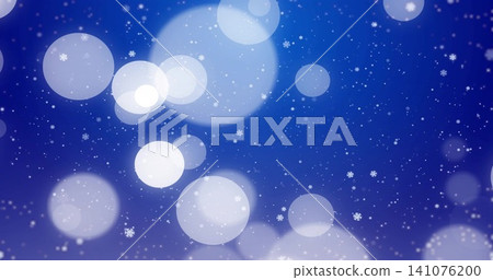 Drifting winter bokeh pattern filling digital blue backdrop, showing snowflakes and light orbs Drifting winter bokeh pattern filling digital blue backdrop, showing snowflakes and light orbs 141076200