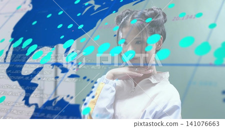 Posing woman with hair buns wearing white zip-up jacket in studio, showing world map markers Posing woman with hair buns wearing white zip-up jacket in studio, showing world map markers 141076663