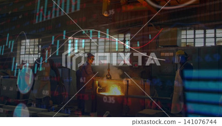 Using hoist ladle, worker wearing goggles and coat pouring molten metal at forge with market charts Using hoist ladle, worker wearing goggles and coat pouring molten metal at forge with market charts 141076744