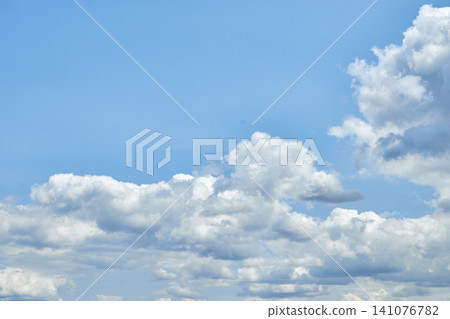 Cumulus cloudscape texture. Sunny summer sky background. Cumulus cloudscape texture. Sunny summer sky background. 141076782