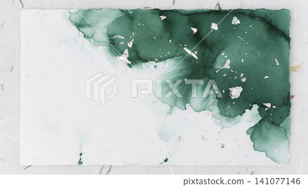 A deep emerald green watercolor and platinum foil swirling diagonally across a Japanese paper background. A deep emerald green watercolor and platinum foil swirling diagonally across a Japanese paper background. 141077146