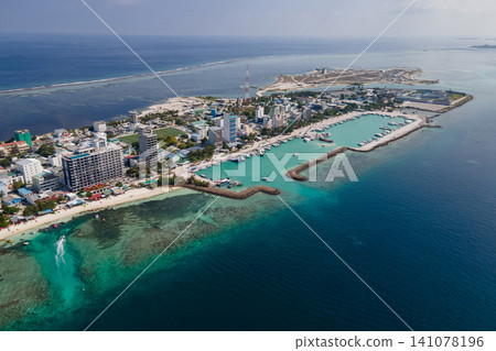 Aerial view of Maafushi islands in Kaafu Atoll, Maldives Aerial view of Maafushi islands in Kaafu Atoll, Maldives 141078196