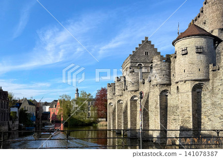 Medieval Gravensteen castle along the Leie River in the East Flanders city of Ghent Belgium. 141078387