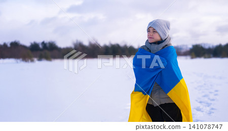 Happy Little Boy Ukrainian Patriot Child With National Flag On Winter Snow Background Happy Little Boy Ukrainian Patriot Child With National Flag On Winter Snow Background 141078747