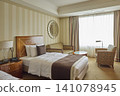 Hotel room with sofa and large window 141078945