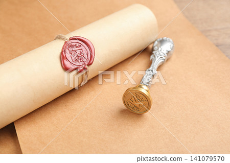 Notary's public pen and document with wax stamp on table Notary's public pen and document with wax stamp on table 141079570