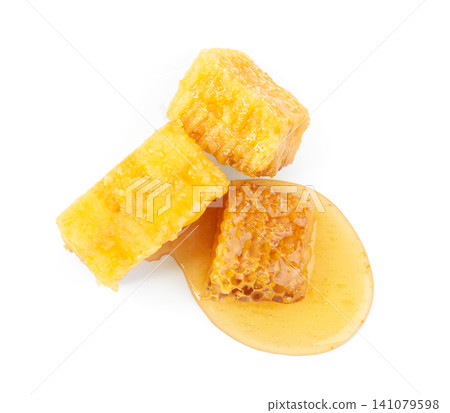Pieces of tasty fresh honeycomb isolated on white, top view 141079598