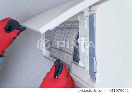 Air conditioner filter cleaning service Air conditioner filter cleaning service 141079641