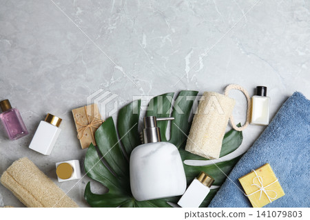 Flat lay composition with soap dispenser on grey marble background. Space for text Flat lay composition with soap dispenser on grey marble background. Space for text 141079803