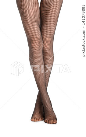 Woman wearing black tights and stylish shoes on light grey background, closeup of legs Woman wearing black tights and stylish shoes on light grey background, closeup of legs 141079893