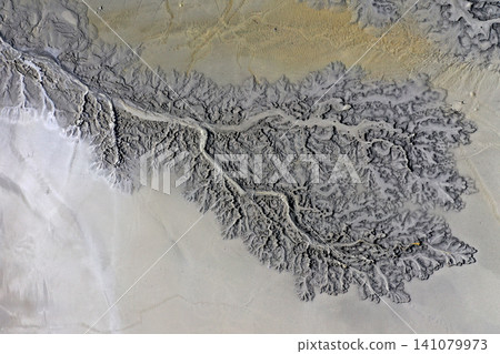 Abstract mud cracks and patterns aerial view Abstract mud cracks and patterns aerial view 141079973