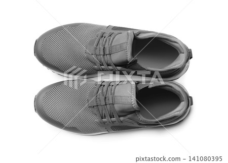 Pair of stylish shoes on white background, top view 141080395