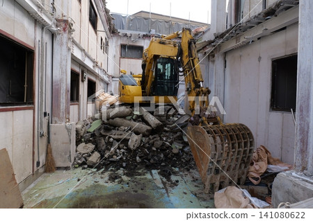 Bulldozer Demolishing Old Building at Construction Site in Japan 141080622