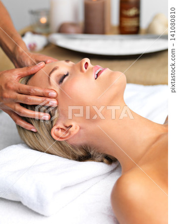 Woman, head massage or spa as wellness, self care or mental health of skin, cleaning or luxury sleep. Peace, customer or hand to relax, oil or chakra by salon, facial or zen in cosmetology studio Woman, head massage or spa as wellness, self care or mental health of skin, cleaning or luxury sleep. Peace, customer or hand to relax, oil or chakra by salon, facial or zen in cosmetology studio 141080810