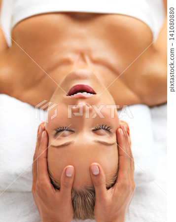 Luxury, spa or girl in head, massage or self care to relax, wellness or skincare as dream therapy. Mental health, woman or zen in clinic, chakra or salon to imagine of peace, cosmetology or table 141080880
