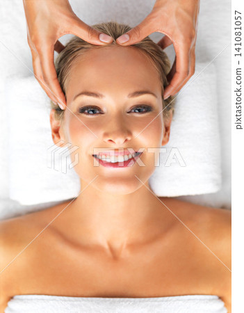 Portrait, beauty or treatment as head, massage or wellness in spa, therapy or mental health. Woman, hand or smile to relax, self care or luxury in zen, retreat or chakra of peace, balance or reiki Portrait, beauty or treatment as head, massage or wellness in spa, therapy or mental health. Woman, hand or smile to relax, self care or luxury in zen, retreat or chakra of peace, balance or reiki 141081057
