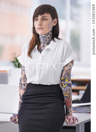 Tattoo, woman and fashion in office for style, bold and funky for trendy, profession and career for work. Young person and stand for business, creative or vibrant in company for job or employee 141081469