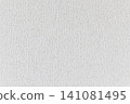 Stylish white wallpaper/wall texture background with an embossed plaster pattern. 141081495