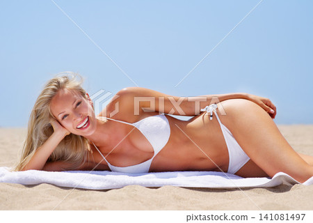 Happiness, sunbathing and woman in bikini, relax and smile for summer vacation, break and holiday. Adult, girl and female person in Brazil for beach, tropical and sunshine on body and outdoor Happiness, sunbathing and woman in bikini, relax and smile for summer vacation, break and holiday. Adult, girl and female person in Brazil for beach, tropical and sunshine on body and outdoor 141081497