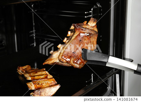 Delicious roasted ribs in oven. Yummy meat 141081674
