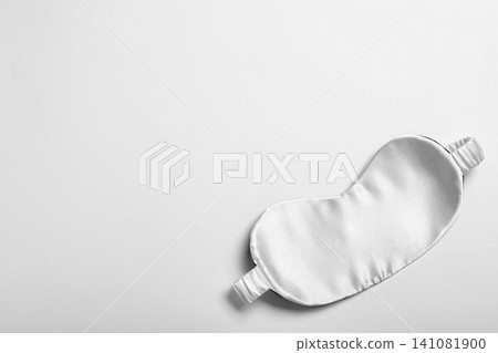 Sleeping mask isolated on white, top view. Bedtime accessory Sleeping mask isolated on white, top view. Bedtime accessory 141081900