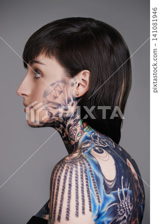 Woman, tattoo and ink for creative, body and design for picture and symbol for blue and colourful. Young person and look with art for bold, cool and statement for funky, trendy and unique for edgy 141081946