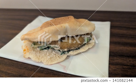 Falafel sandwich in flat pita bread Falafel sandwich in flat pita bread 141082144