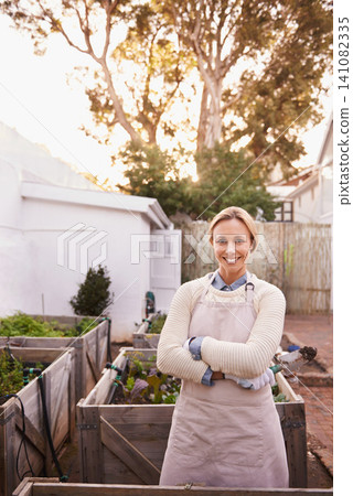 Gardening, portrait or woman in backyard with arms crossed or plants for landscaping, planting and growth. Agriculture, nature or happy person for outdoor environment, growing vegetables and nursery Gardening, portrait or woman in backyard with arms crossed or plants for landscaping, planting and growth. Agriculture, nature or happy person for outdoor environment, growing vegetables and nursery 141082335