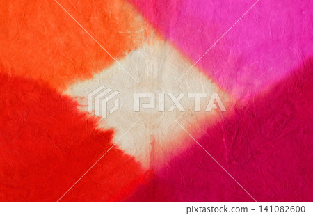 A gradient of reddish hues bleeding through washi paper. A gradient of reddish hues bleeding through washi paper. 141082600