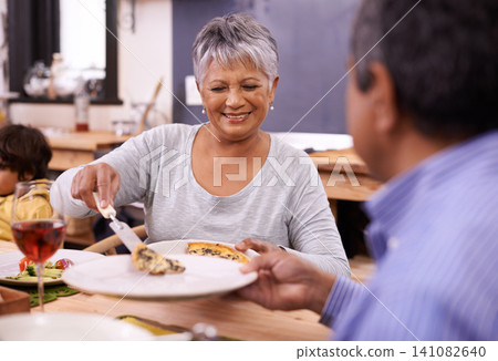 Senior, happy woman and family with food for thanksgiving dinner, meal or serving at the table. Mature and hungry couple with smile for dining, eating or lunch in happiness together at the house Senior, happy woman and family with food for thanksgiving dinner, meal or serving at the table. Mature and hungry couple with smile for dining, eating or lunch in happiness together at the house 141082640