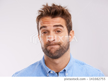 Studio, portrait and bored man with doubt, frustrated and confused on white background. Opinion, disappointment and face of person with decision, conflict or uncertainty for choice, news or ideas Studio, portrait and bored man with doubt, frustrated and confused on white background. Opinion, disappointment and face of person with decision, conflict or uncertainty for choice, news or ideas 141082755