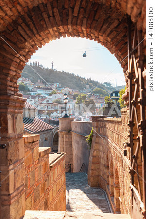 October 2024 Tbilisi Georgia brick archway and cable car editorial October 2024 Tbilisi Georgia brick archway and cable car editorial 141083100