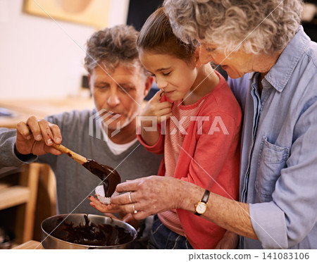 Help, grandparents and baking with girl, kitchen and home with happiness and bonding together with recipe. Family, grandchild and old man with senior woman and hobby with utensils, food and taste Help, grandparents and baking with girl, kitchen and home with happiness and bonding together with recipe. Family, grandchild and old man with senior woman and hobby with utensils, food and taste 141083106