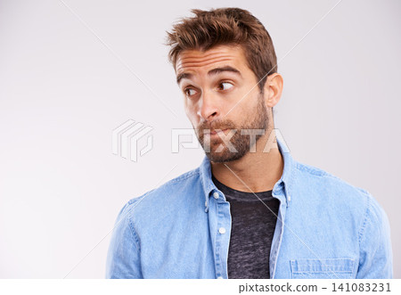 Thinking, confused and man with ideas, unsure or uncertain on white studio background with solution or emoji. Person, model or guy with thought or question with why and emotion with reaction or doubt 141083231
