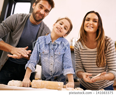 Portrait, mother and father baking with child in a kitchen teaching for help, support or learning in home. Family, smile or girl cooking bread with parents, dad and mom for dinner, pizza or lunch Portrait, mother and father baking with child in a kitchen teaching for help, support or learning in home. Family, smile or girl cooking bread with parents, dad and mom for dinner, pizza or lunch 141083375