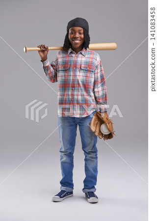 Baseball, portrait and child in a studio with game, sport and fitness gear with a smile of a kid. Youth, happy and African boy with modern, casual and hipster fashion with a workout glove and a teen 141083458