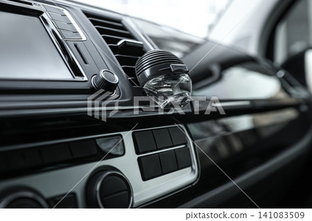 Stylish air freshener clip attached to car ventilation Stylish air freshener clip attached to car ventilation 141083509
