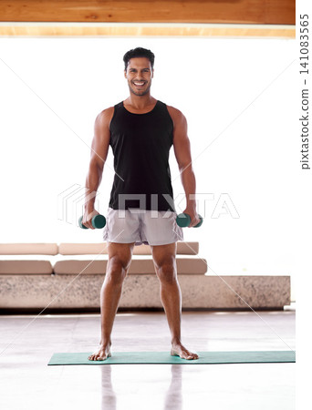 Man, portrait and dumbbell workout or weightlifting routine in home or healthy training, athlete or exercise. Male person, face and equipment or wellness strong or muscle growth, warm up or practice Man, portrait and dumbbell workout or weightlifting routine in home or healthy training, athlete or exercise. Male person, face and equipment or wellness strong or muscle growth, warm up or practice 141083565
