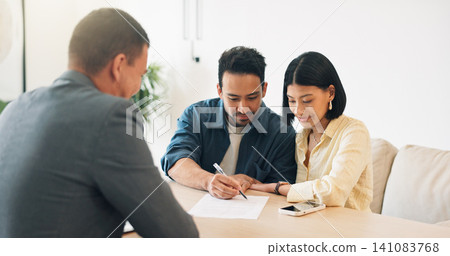 Documents, signature and couple with financial advisor in house for terms and conditions on home loan. Contract, offer and accountant with people for savings or investment planning in apartment. Documents, signature and couple with financial advisor in house for terms and conditions on home loan. Contract, offer and accountant with people for savings or investment planning in apartment. 141083768