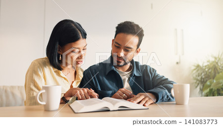 Couple, reading or Bible study for religion in house, coffee and listen to scripture with faith in God. People, book or learning Christianity for worship, bonding and spiritual growth with gospel 141083773