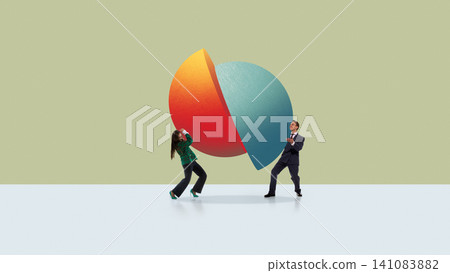 Man and woman holding large divided sphere on minimalist green background. Man and woman holding large divided sphere on minimalist green background. 141083882