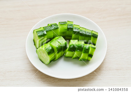 Cucumbers that have been rubbed with a cutting board and then pickled in salt Cucumbers that have been rubbed with a cutting board and then pickled in salt 141084358