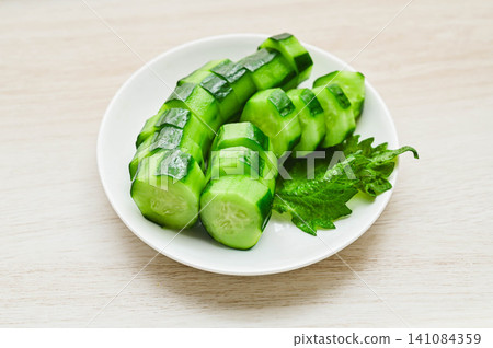 Cucumbers that have been rubbed with a cutting board and then pickled in salt Cucumbers that have been rubbed with a cutting board and then pickled in salt 141084359