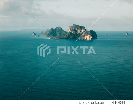 Panoramic aerial seascape of scattered limestone islands in the vast calm Andaman Sea, Krabi. 141084461