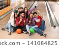 Group of friends taking selfie in bowling club Group of friends taking selfie in bowling club 141084825