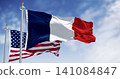 National flags of France and USA waving in the wind on a clear day 141084847