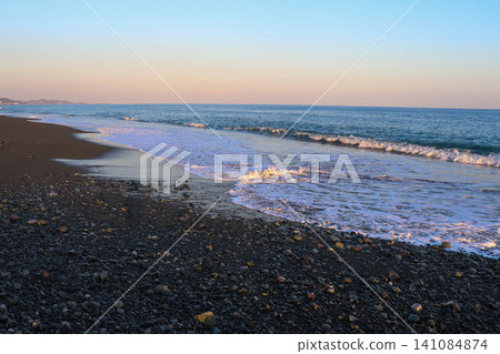 Waves to beat on the sandy beach Waves to beat on the sandy beach 141084874
